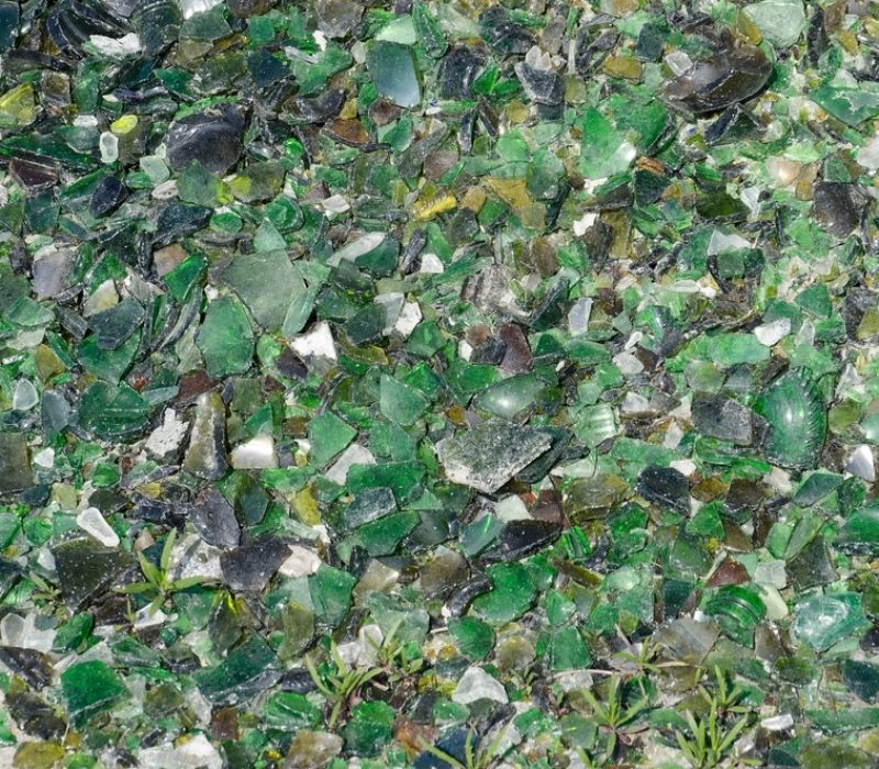 Old,Broken,Pieces,Of,Glass,At,The,Recycling,Centre.