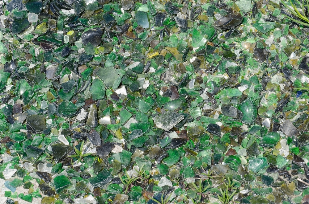 Old,Broken,Pieces,Of,Glass,At,The,Recycling,Centre.